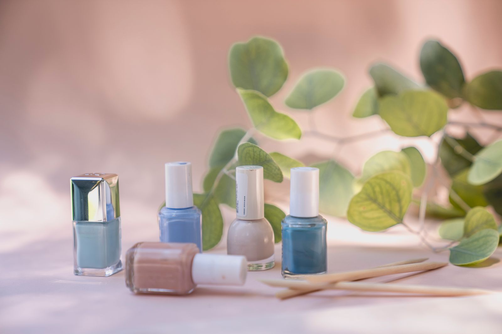 Nail polish bottles on the Velour color wall